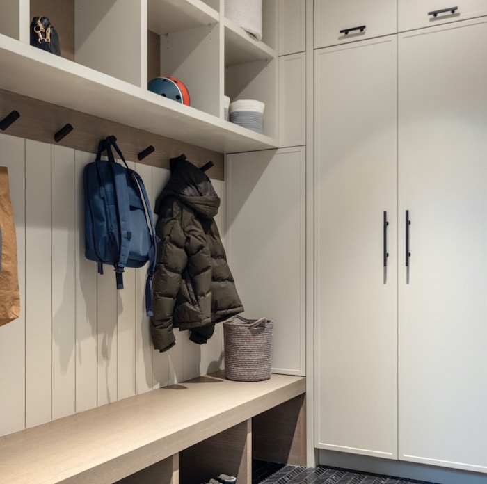 Where to put backpacks after school. Practical ideas on how to store and organize kids backpacks to keep your home tidy and uncluttered. Backpack organizer idea.