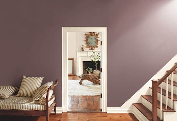 Benjamin Moore Cinnamon Slate Entryway Paint Color. Hallway. Plum walls with wood floors, upholstered bench, elegant, modern, transitional
