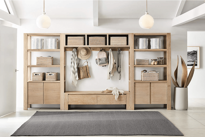Beautiful white oak bookcase, bench and wall shelf for a functional entryway. Cozy entryway. Entry organization idea.
