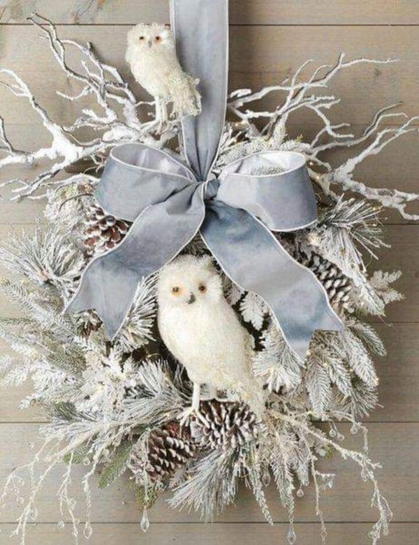 Elegant Woodland Christmas Wreath Decor Ideas. Decor Ideas With Owls and ribbon. White and Blue Christmas tree decor, Owl ornaments, 2025 Christmas trends, Woodland Christmas tree ornaments, pinecones decor, Christmas decor theme, Christmas tree colors, nordic, winter wonderland, snowy.