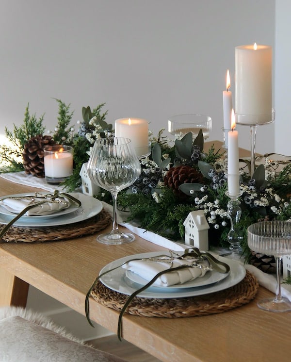 Simple Christmas Table Decor Ideas WIth Cedar Greenery, Baby's Breath Flowers and Ribbon. DIY Christmas Tree Napkin fold. Green and White.