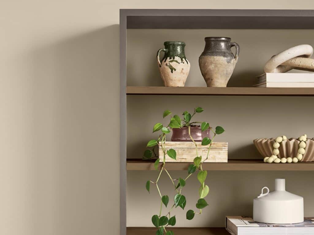 Sherwin Williams Universal Khaki Wall Color Idea. wood bookshelf with decor ideas, neutral, earth tones, rustic modern, traditional, pottery barn style, traditional farmhouse home inspiration, decorating ideas
