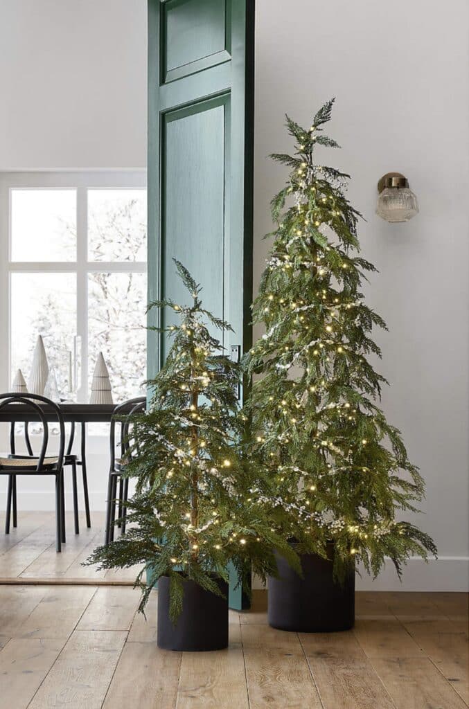 Minimalist Modern Potted Faux Hemlock Christmas Trees, cozy, elegant, holiday decor ideas, Christmas tree decorating inspiration, neutral, twinkle lights