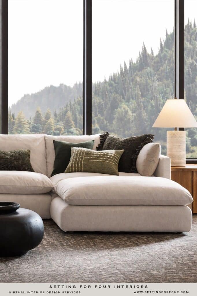 Cozy Living Room Decor Trend Ideas, 2026 design trends, sectional sofa in front of window, neutral color palette, green palette with beige, round coffee table for sectional, chaise sectional sofa idea, Nancy Meyers style, Crate & Barrel aesthetic